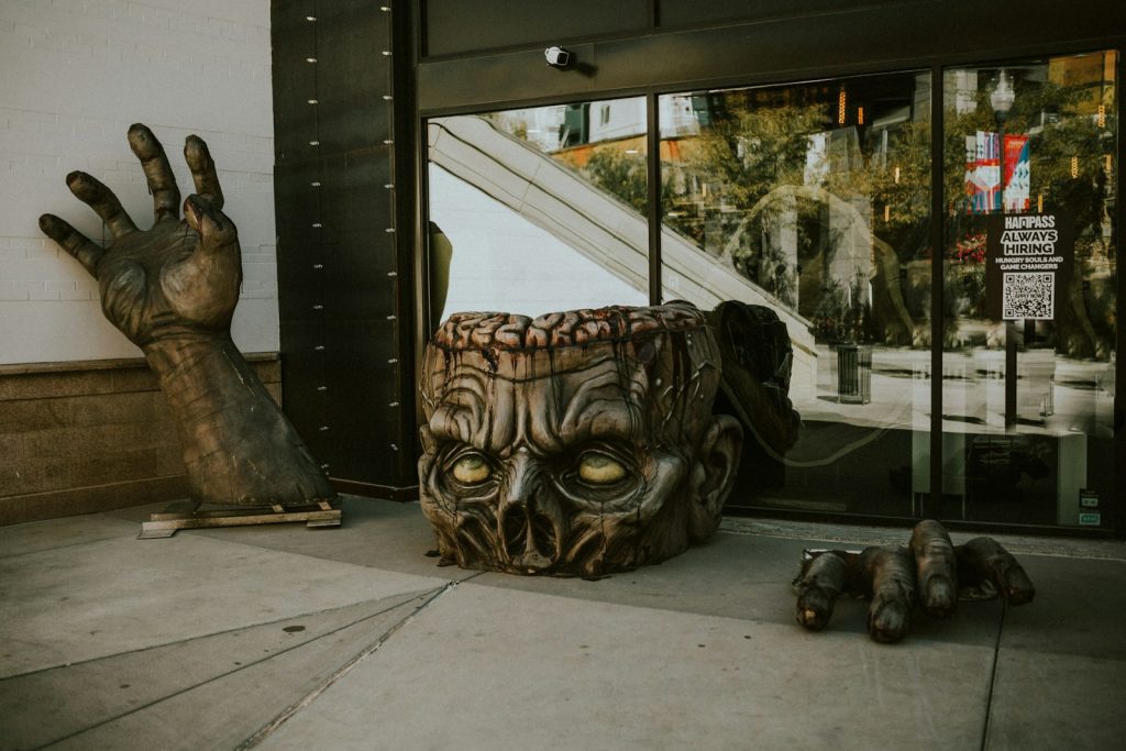 a statue of a dragon and a turtle in front of a store